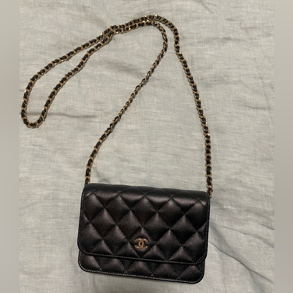 21P CHANEL MINI WALLET ON CHAIN. black caviar leather with burgundy interior.